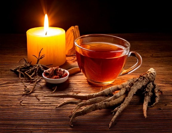 Fresh Devil's Claw roots and cup of tea