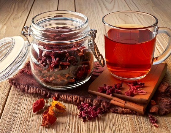 Jar of dried vitex berries, herbal tea