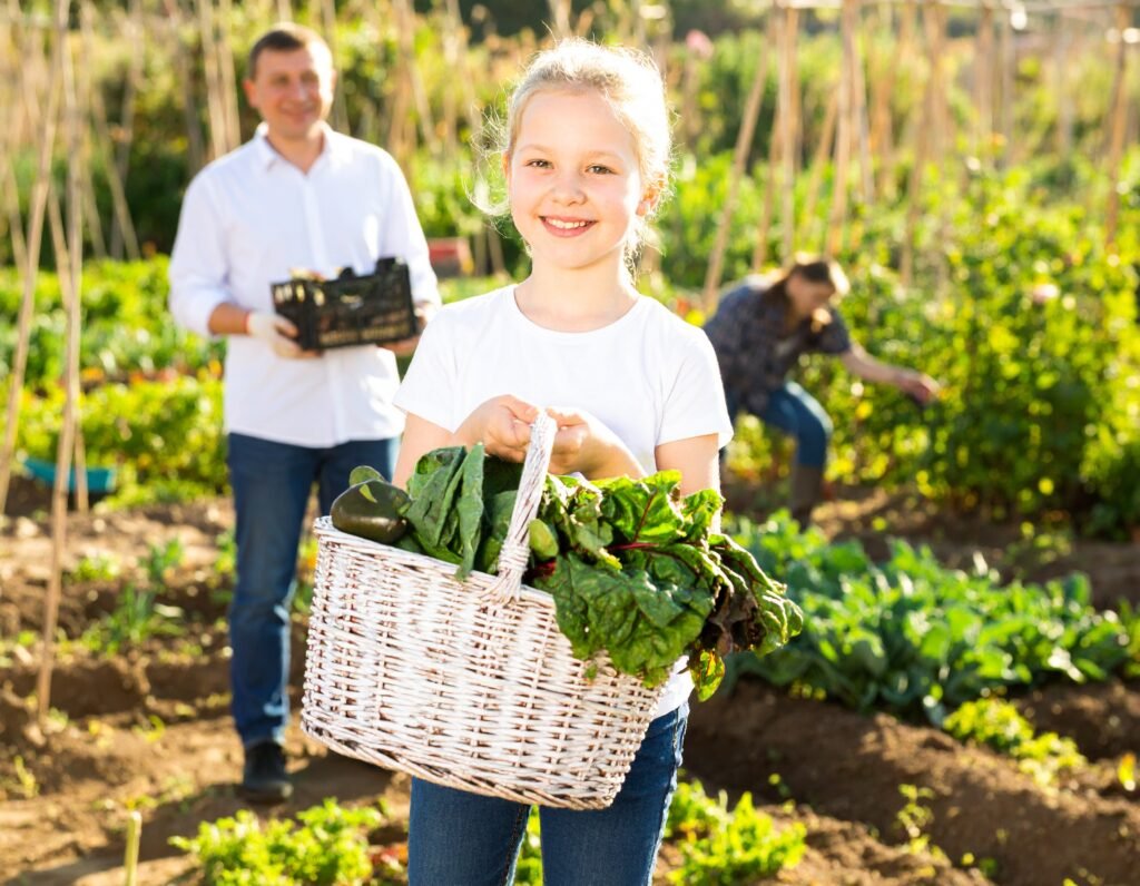 Family harvesting spring greens together
