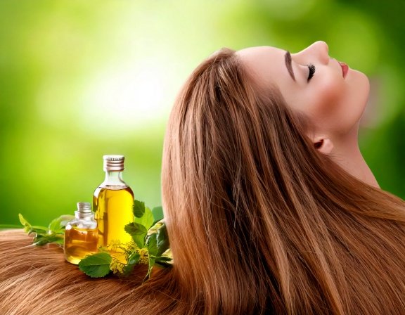 long healthy hair with fresh rosemary oil